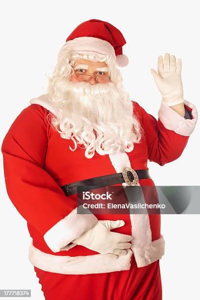 Santa Claus Waving Stock Photo - Download Image Now - Adult, Bag, Beard