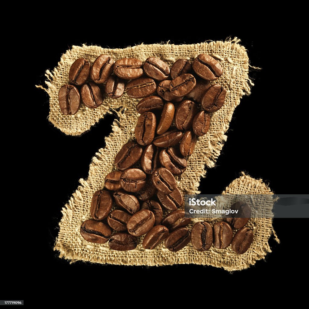 Alphabet aus Kaffeebohnen auf Stoff Textur, isoliert, schwarz - Lizenzfrei Alphabet Stock-Foto