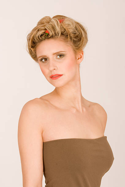 Attractive woman with hair vegetable and fruit chain