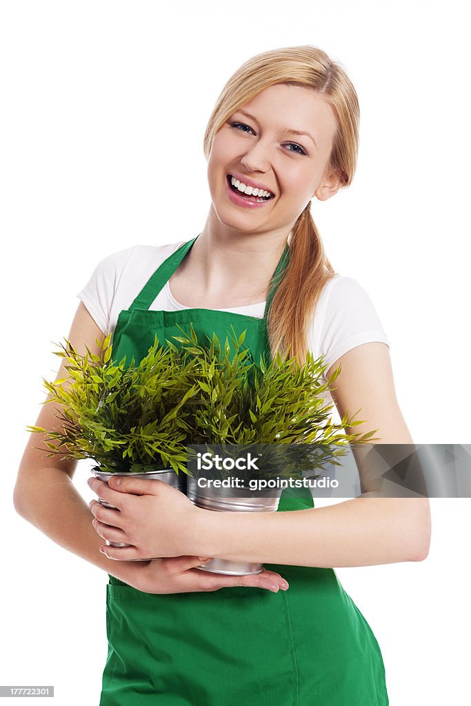 Glücklich weibliche Gärtner mit ihren Pflanzen - Lizenzfrei Weibliche Person Stock-Foto