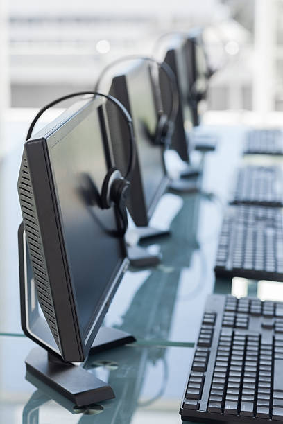 istock Computers and headsets from a call center 177723223