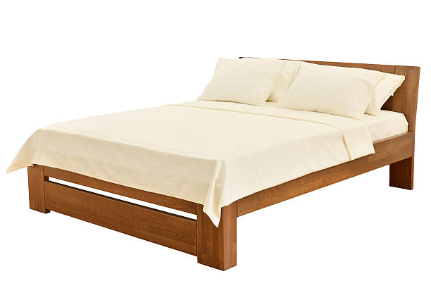 bed on white stock photo