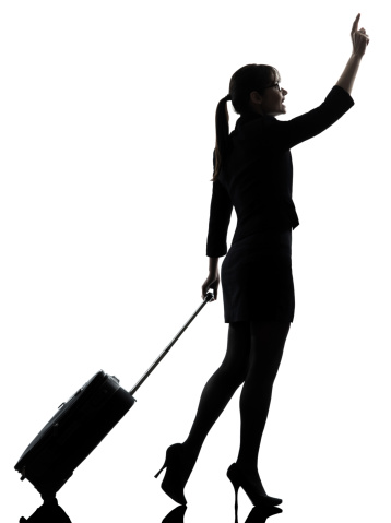 one business woman traveler walking hailing silhouette studio on white background