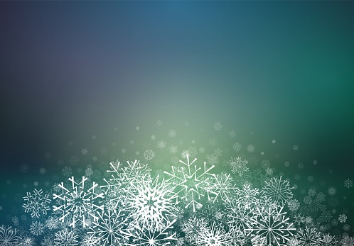 Christmas card with snowflakes falling on soft blurred background. Xmas or winter holidays greetings card with snowfall and glowing backdrop