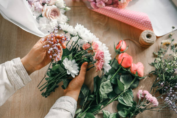 istock Florist at work. Woman making autumn floral decorations 1777254614