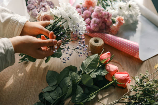 istock Florist at work. Woman making autumn floral decorations 1777254618
