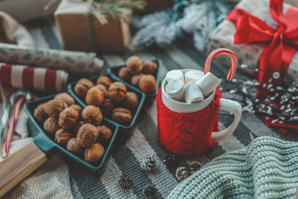 Cup of cocoa with marshmallows in a Christmas atmosphere.