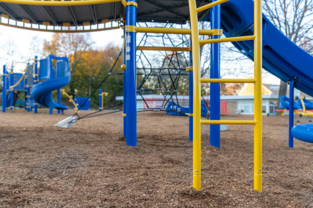 istock Unidentified typical elementary school playground with engineered wood fiber safety fall surface 1777259111