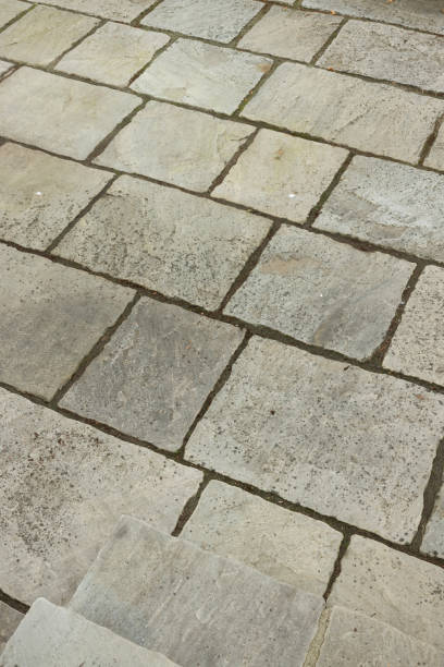 istock Dirty grey garden patio paving slabs, UK 1777263740