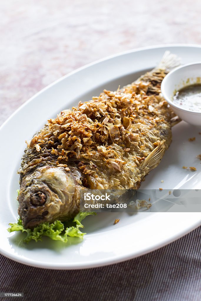 Java En Barb Deep Fried Java Barb Fish With Garlic Stock Photo - Download Image Now ...
