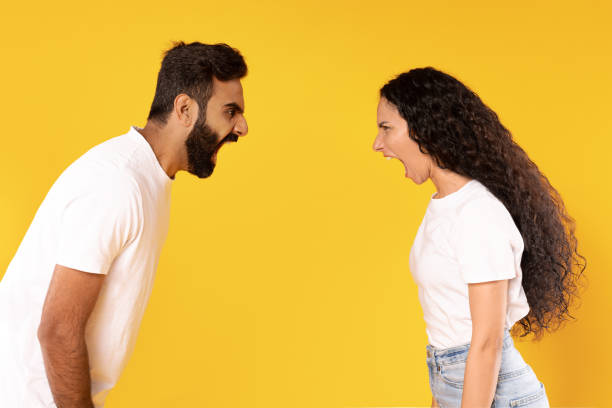 istock Mad Arabic Couple Shouting Having Quarrel Standing On Yellow Background 1777267061
