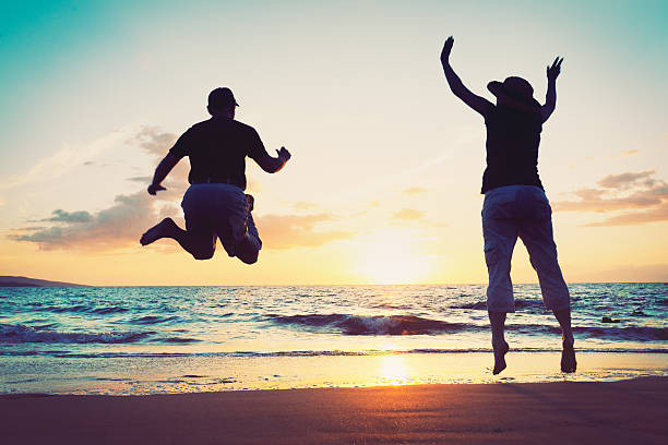 istock Senior Couple Enjoying Sunset at the Beach 177727738
