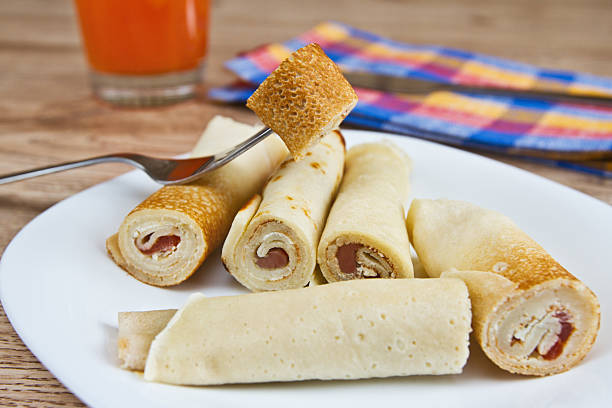 pancakes with red salt fish and soft cheese
