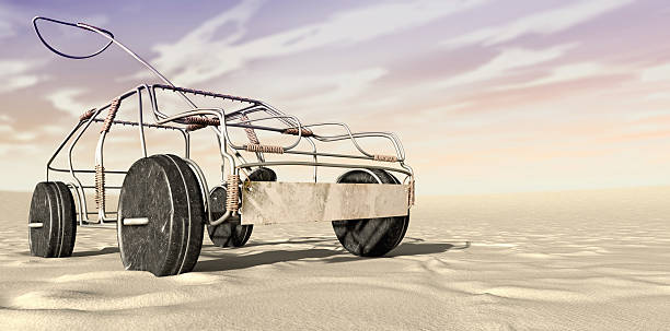 A traditional south african handmade wire toy car made out of metal and copper wire with tin cans as wheels in a desert landscape