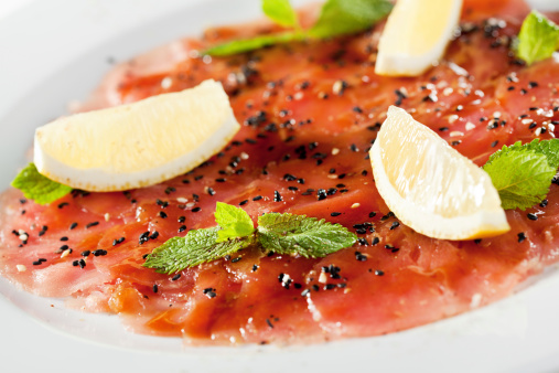 Appetizer - Tuna Carpaccio with Parmesan Cheese, Herbs and Lemon Slice