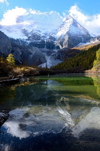 Snow mount reflected in the Pearl Lake stock photo