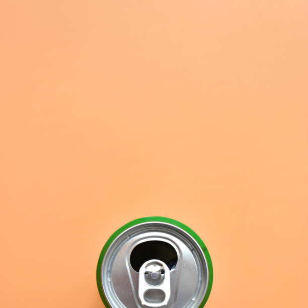 istock aluminum green drink cans on orange background, open cold fresh beverage 1777327256