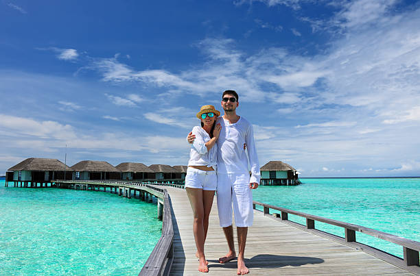 istock Couple on a beach jetty at Maldives 177732782