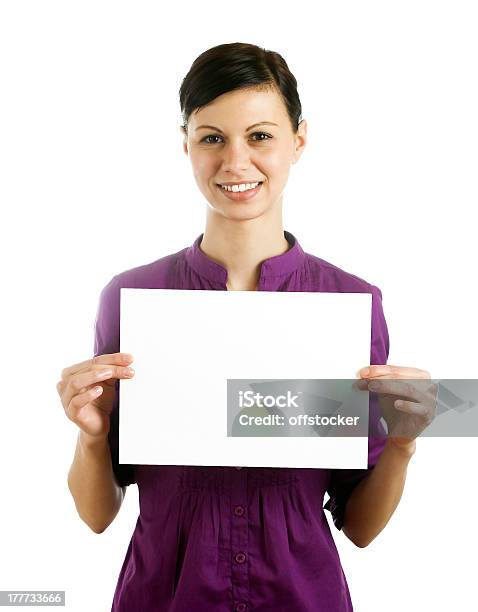 Businesswomen Holding Blank Page Stock Photo - Download Image Now - Page, White Color, Young Women