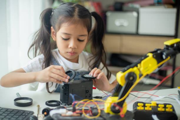 istock STEM education concept. Asian young girl learning robot design. 1777358178