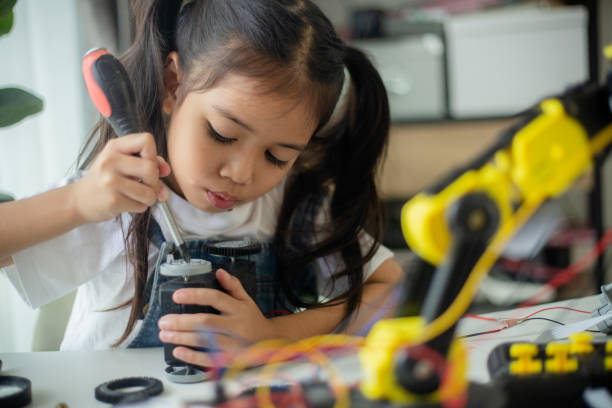 istock STEM education concept. Asian young girl learning robot design. 1777358200