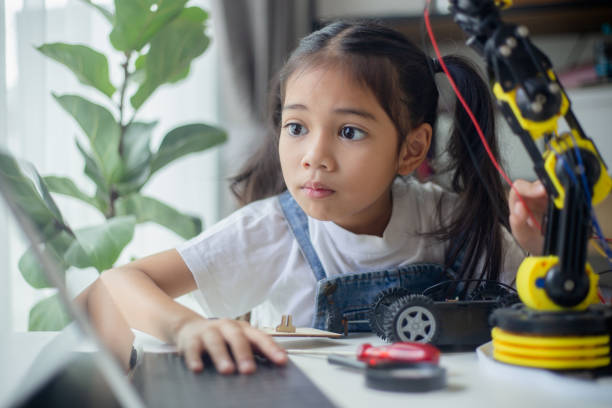 istock STEM education concept. Asian young girl learning robot design. 1777358214