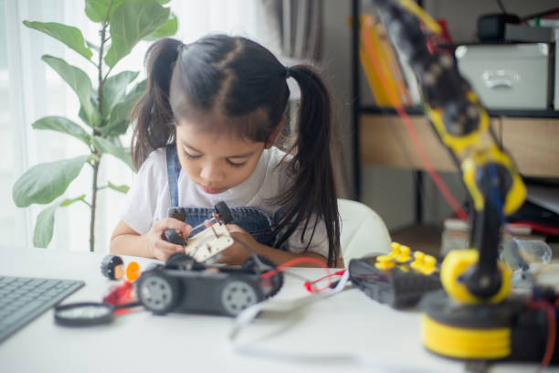 istock STEM education concept. Asian young girl learning robot design. 1777358594