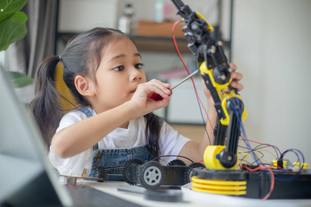 istock STEM education concept. Asian young girl learning robot design. 1777358650