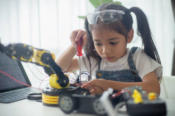 istock STEM education concept. Asian young girl learning robot design. 1777358736