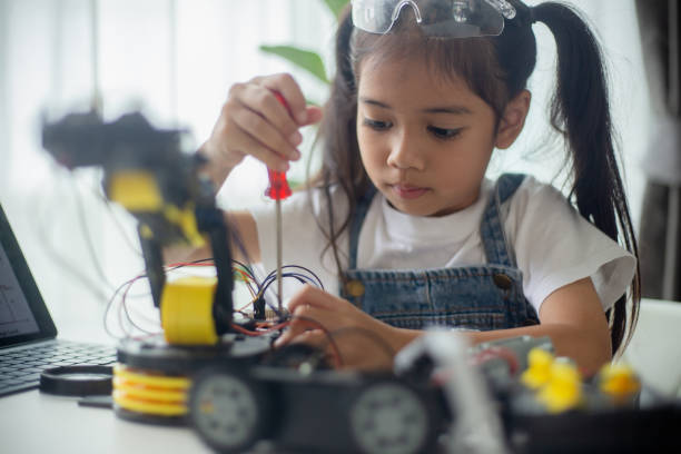 istock STEM education concept. Asian young girl learning robot design. 1777358738