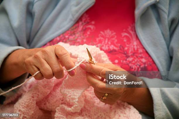 Grandmother Knitting A Pink Blanket Stock Photo - Download Image Now - Adult, Grandmother, Horizontal