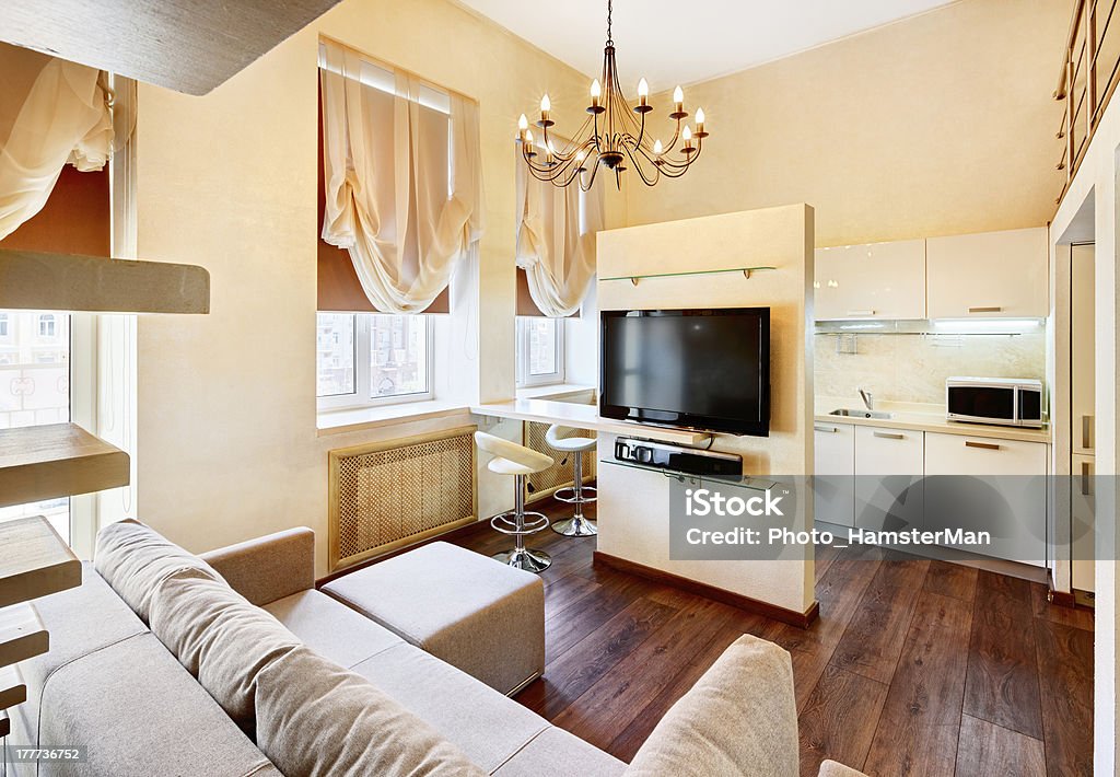Modern minimalism style living-room interior with lcd TV Modern minimalism style living-room interior with lcd TV in pastel tones. Indoors Stock Photo