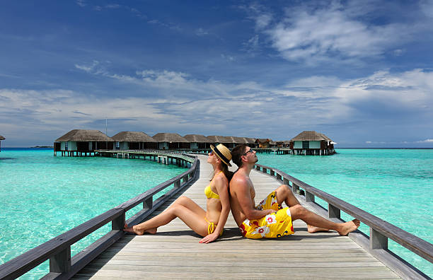 istock Couple on a beach jetty at Maldives 177736954