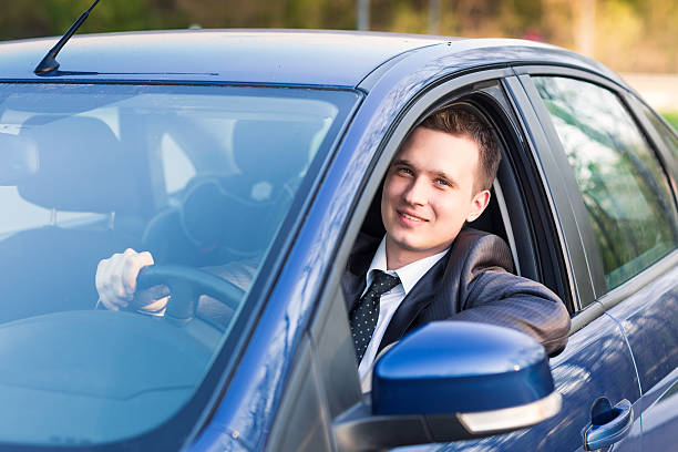 istock Handsome young businessman in his new car 177736960