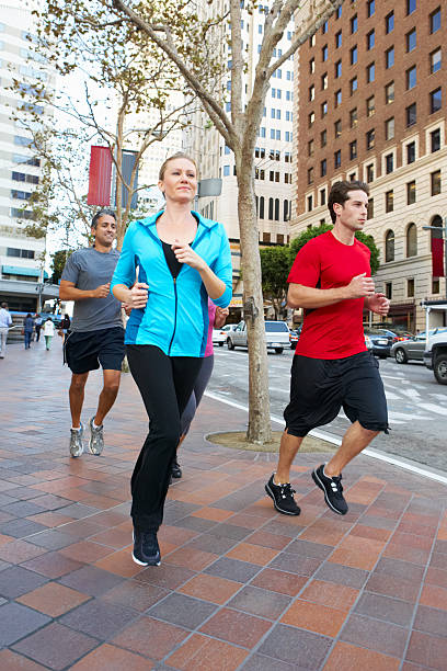 istock Group Of Runners On Urban Street 177737378