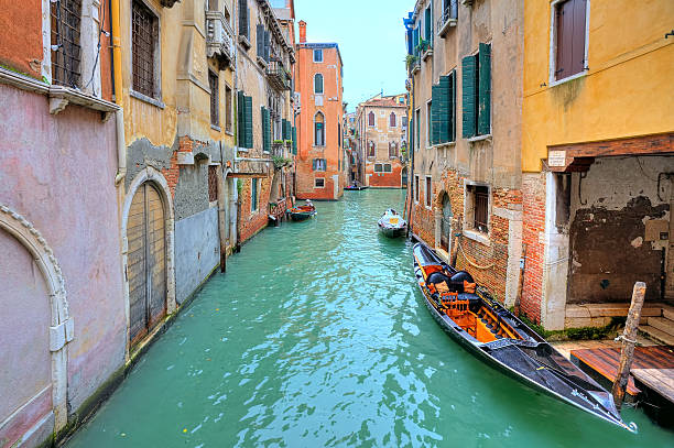 istock Gondola on small canal in Venice, Italy. 177737550