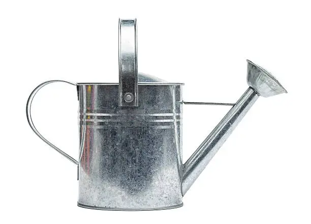 Steel made, silver colored watering can, isolated on white background.