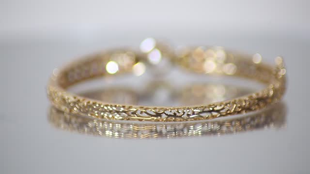 beautiful golden bracelet gemstone gold platinum with diamond bangle.