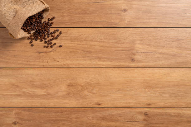istock The many coffee beans are placed around on a wooden table 1777404008