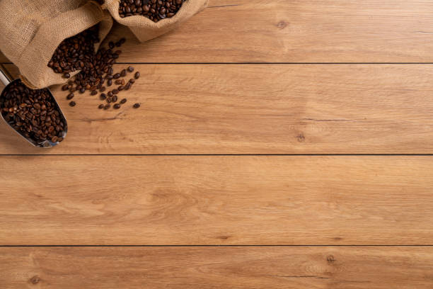 istock The many coffee beans are placed around on a wooden table 1777404009
