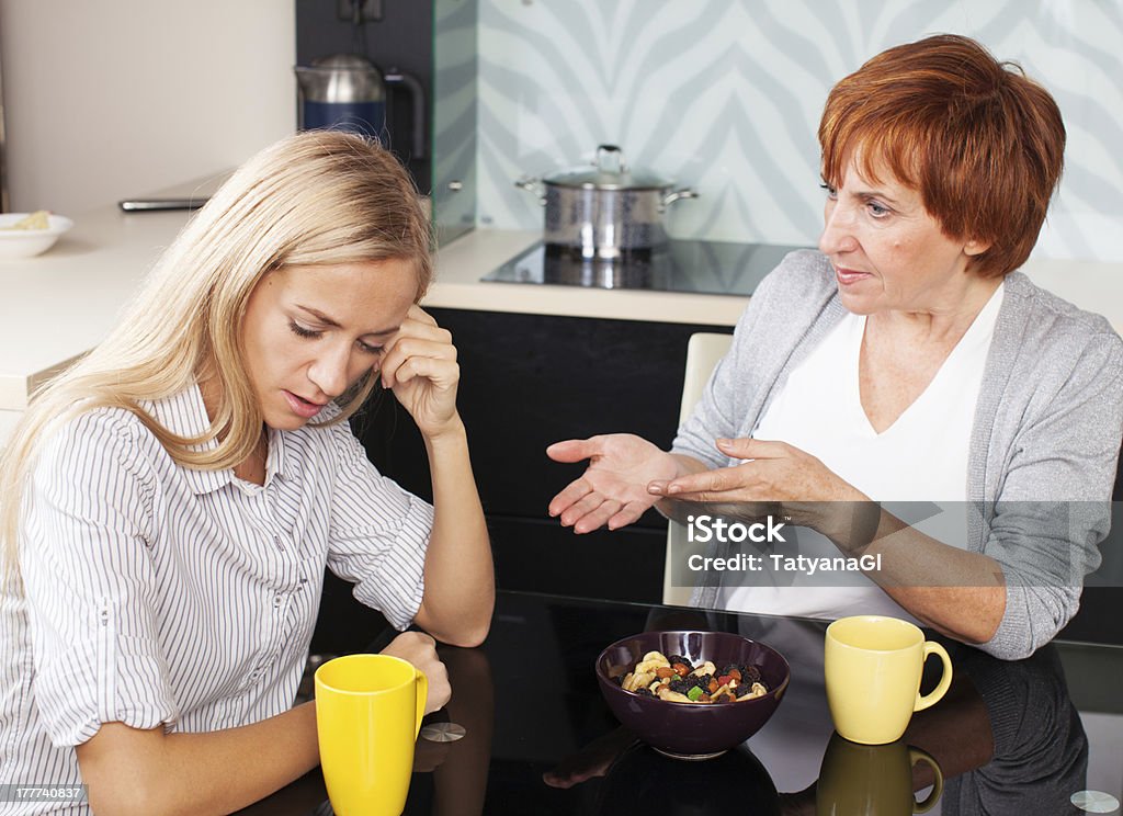 Conflict between mother and daughter Conflict between mother and daughter. Quarrel Mother-In-Law Stock Photo