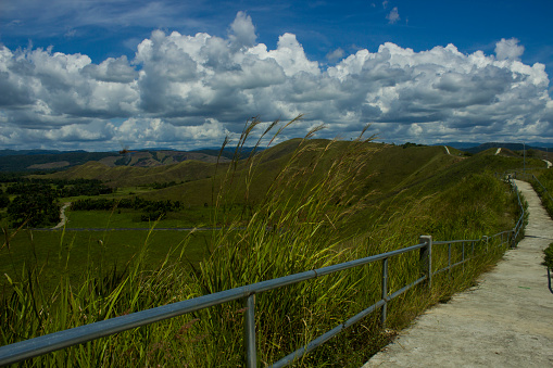 Footpath above the Teletubbies hills in Sentani, Indonesia.