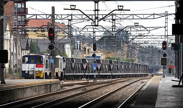 Freight train at railway station goods train coal