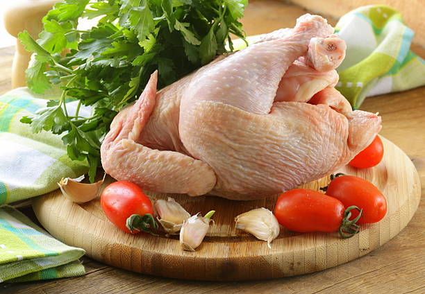 istock raw chicken on a cutting board with vegetables 177742313