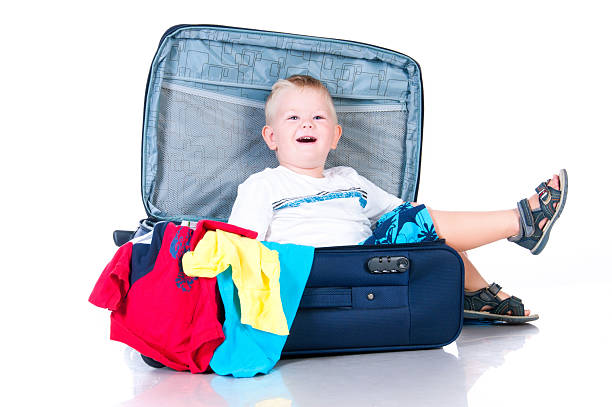 istock Small tourist collects things in a suitcase for travel 177742882