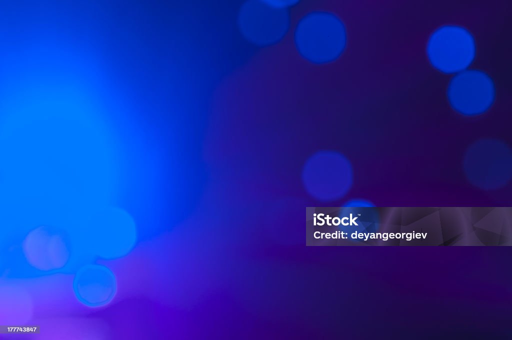 Festive lights and circles. Christmas background Blue and pink festive lights and circles background. Blurred christmas lights Abstract Stock Photo