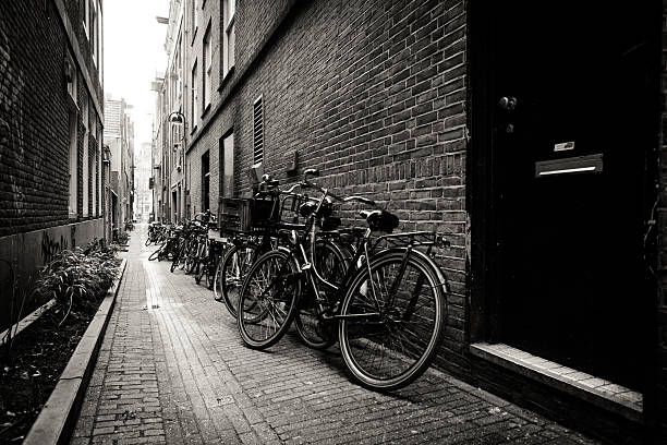 istock Old bicycle parked on a narrow street 177744170