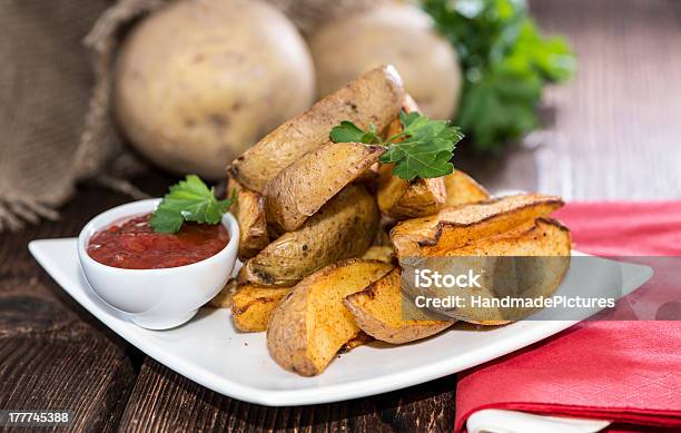 Portion Of Potato Wedges Stock Photo - Download Image Now - Appetizer, Baked, Baked Potato