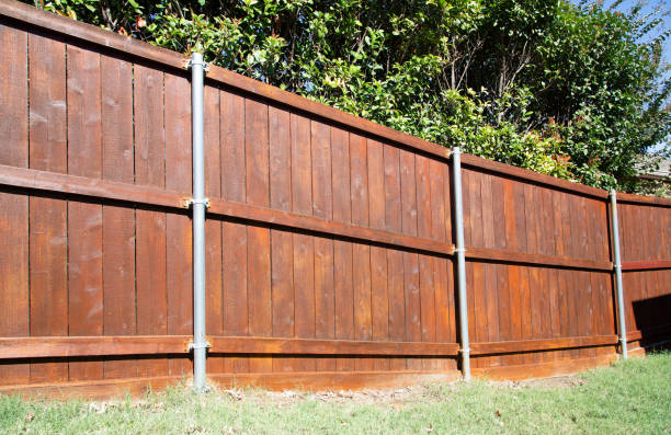 istock Brown wooden fence around single house 1777459462