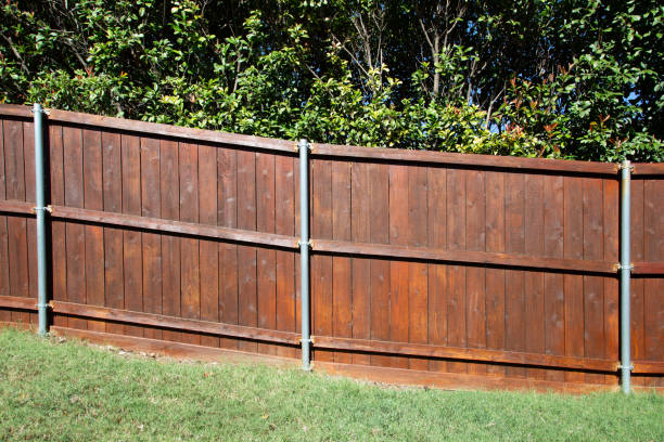 istock Brown wooden fence around single house 1777459476